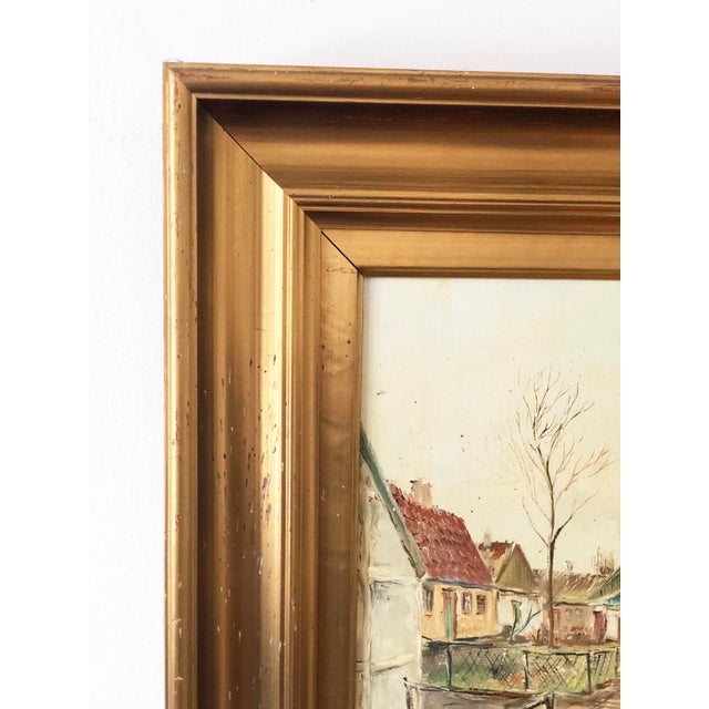 This large vintage original oil painting from the 11940s shows a cozy European village, cottages and blue skies. The...