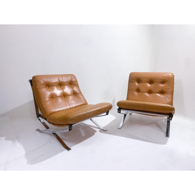 Mid-Century Modern Pair of Italian Armchairs, Original Leather, MIM, 1960s. Wear consistent with age and use. This piece...