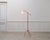 This vintage floor lamp captivates with its light and graphic silhouette, highlighted by its original red color. Its...