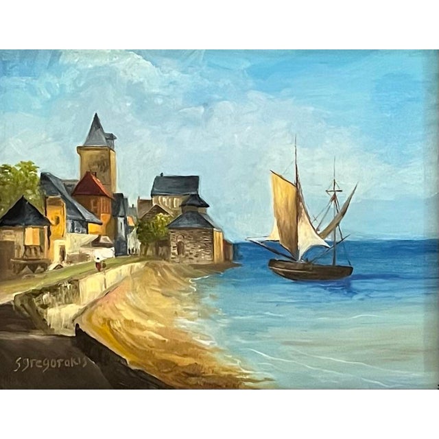 Oil painting on walnut board of an early Netherlandish genre harbor scene, cottages on the left and a calm sea with...