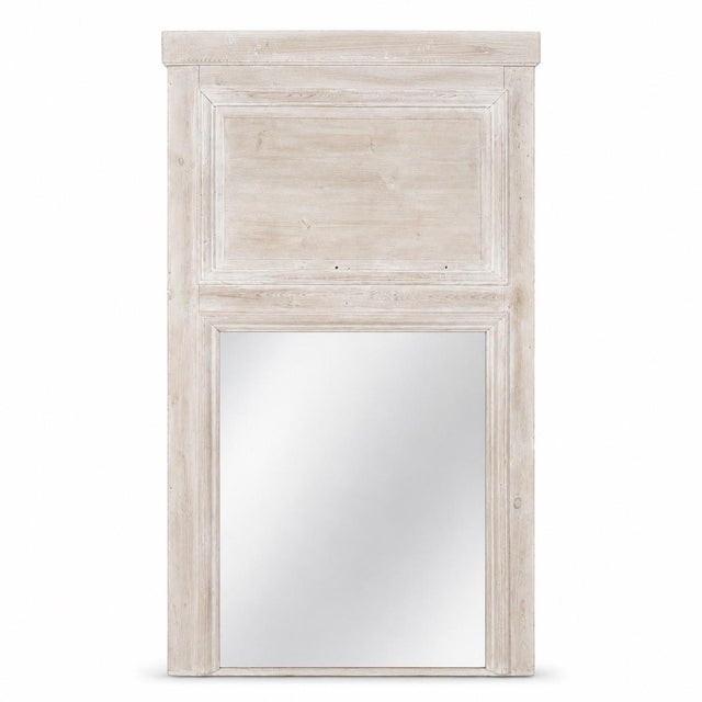 This Antique 19th Century French Whitewashed Pine Boiserie Trumeau was reclaimed from the boiserie of a French château,...