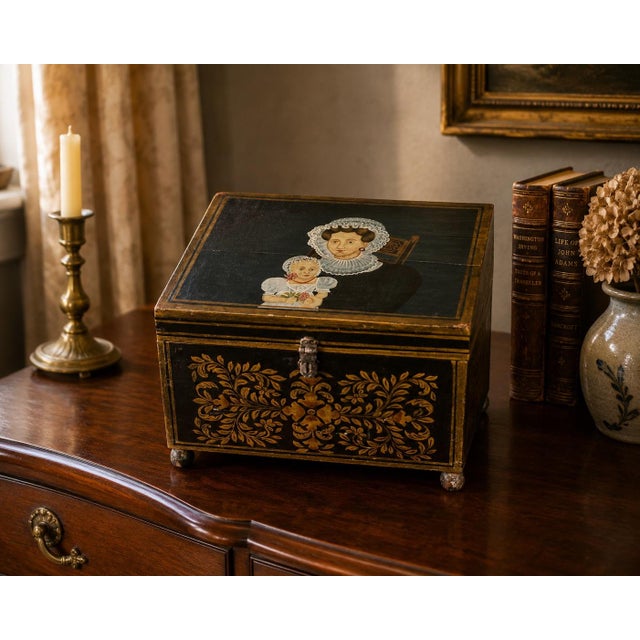 This charming New England folk art document box is a wonderful example of mid-19th century American decorative painting....