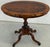 An impressive oval walnut table from the Historicist period, most likely dating to the second half of the 19th century....