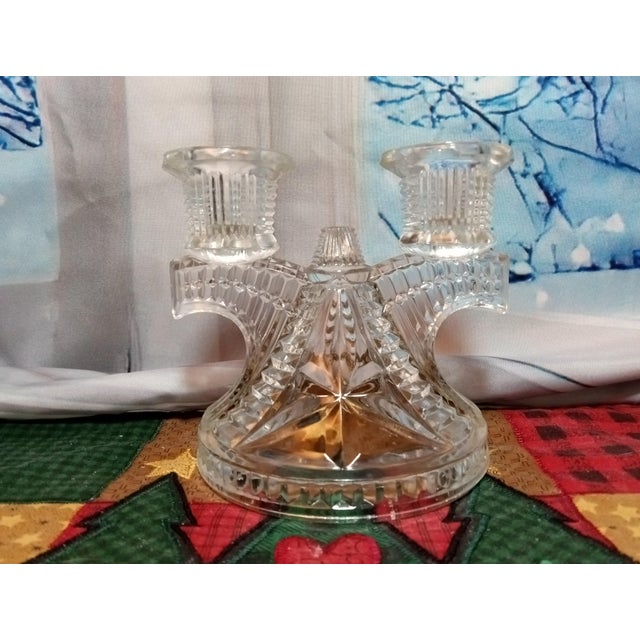 1940s clear pressed Federal Glass, double candle holder and the pattern is called wigwam. It is about 4 1/2" tall and 4...