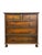 This early 20th-century English chest of drawers is attributed to Hansford Bros., Cabinet Makers and Upholsterers,based on...