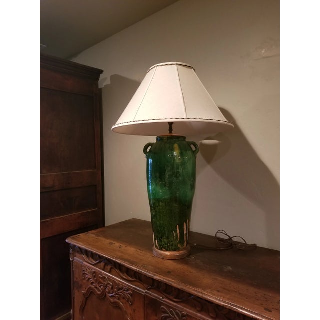 Beautiful green glazed ceramic vase converted into a large lamp.