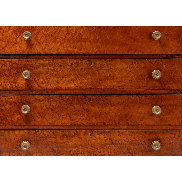 USA, ca. 1820s. A charming antique chest of drawers in the Sheraton taste. Features poplar or pine construction with...