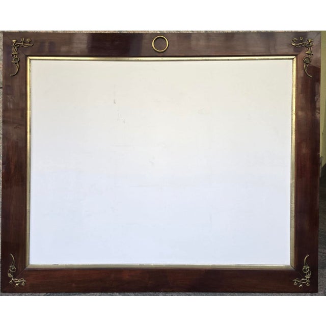 Large Austrian Art Nouveau picture frame executed in mahogany with finely cast brass floral mounts in the Vienna Secession...