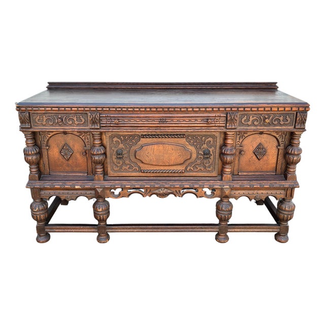 Early 20th Century Jacobean Revival Carved Oak Buffet Sideboard For Sale