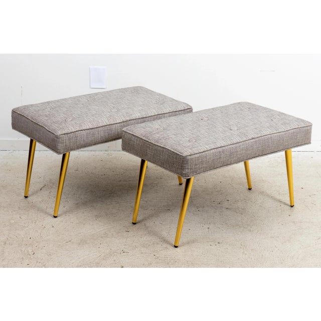 Mid-century style pair of benches. Newly upholstered. Very good condition. Measures: 30" x18" x18".