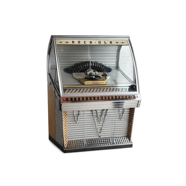 Rock-Ola Jukebox Model 1448 Dimensions: Height x Width x Depth 145 x 77 x 70 cm. Original Rock-Ola jukebox, model 1448,...
