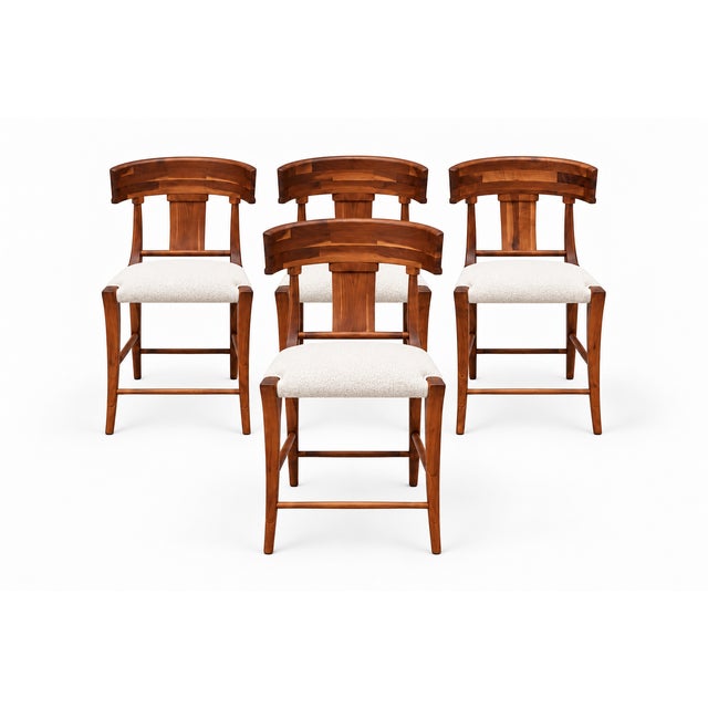 Set of Four Mid-Century Solid Walnut Klismos-Style Counter Stools with Bouclé Seats A beautiful set of four solid walnut...
