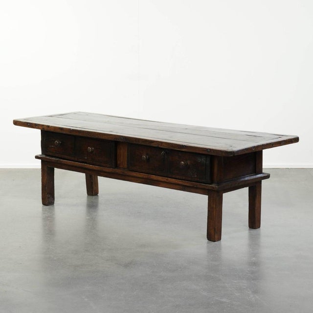This beautiful antique 18th-century Southern European chestnut coffee table has 2 drawers and a working lock with its...