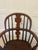 A charming and authentic antique Georgian child’s Windsor chair in solid elm, beautifully made with classic country...