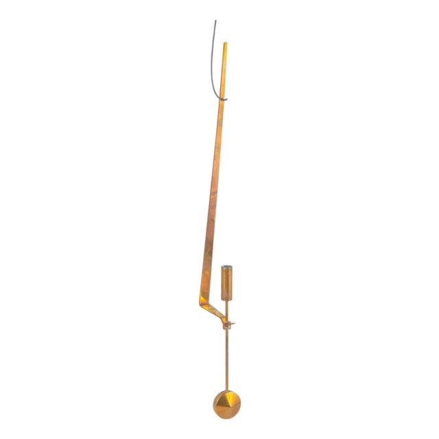 Wall Candleholder in Brass with Pendulum Suspension by Pierre Forsell for Skultuna, 1960s For Sale