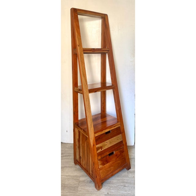 Beautiful Very Nice Heavy Solid-wood 71” Tall Teakwood Ladder Style book case w/ 2 drawers. Its frame features a...