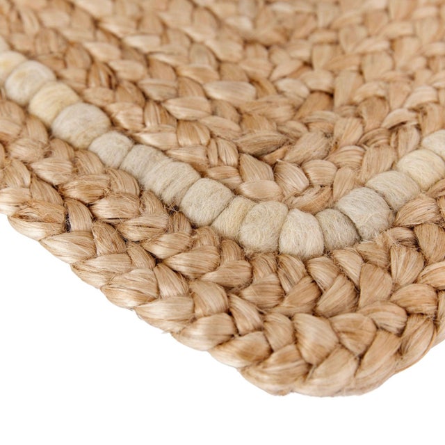 A mix of natural jute and hand-spun wool balls create a fresh yet practical doormat that will impress your guests. Hand...