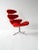 Original Corona armchair by Poul M. Volther for Erik Jørgensen, with a steel frame and red fabric upholstery. Designed in...