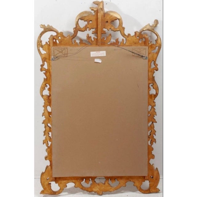 This 1960s Italian mirror is a striking example of the Rococo Revival style, blending 18th-century opulence with mid-20th-...