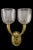 Olympia Due - Art Deco-style 2-light wall sconce with convex oval ridged backplate and tapered cornucopia arms. cut glass...