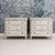 A pair of Swedish bedside chests in the Gustavian style. These chests have beautiful raised panel drawer fronts. There are...