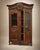 A stunning example of late 19th-century French craftsmanship, this Louis XV Revival armoire showcases richly hand-carved...