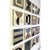 Sixteen 8x8 cradled wood panels make up this encaustic mixed media art piece. In the photo they are hanging spaced...