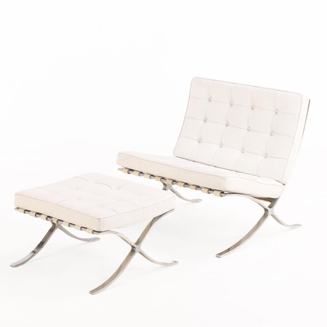 An iconic pair of Barcelona chairs with matching ottomans by Mies van der Rohe for Knoll International, dating to circa...