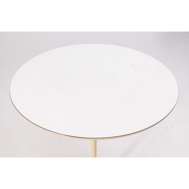 Eero Saarinen for Knoll International Tulip Side Table, c. 1950s. The underside retains original label. This example...