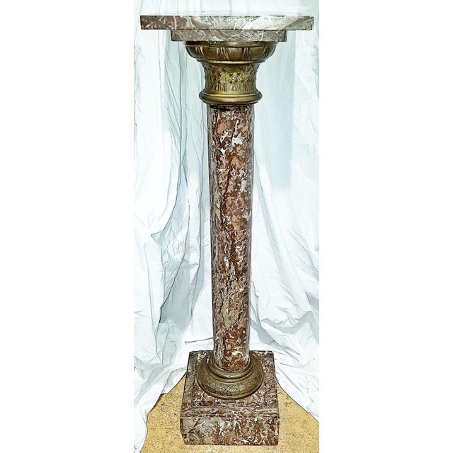 Regal gilt brass embellished soiled cinnamon marble pedestal from France, likely late 19th century. These work perfectly...