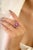 This Ruby Oval Flower Cocktail Ring in 925 Sterling Silver is the perfect blend of luxury and artistry. Featuring a 5.5x4...