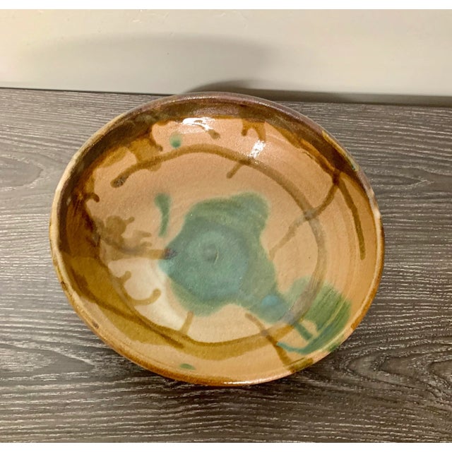 Beautiful turquoise and tan glaze 10” studio bow made in 1986. Use on your side or coffee table or serve salad in it!
