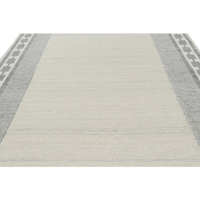 Made with handwoven wool, this 9x13 rug is an exciting new addition to Rug & Kilim’s Scandinavian rug collection—a...