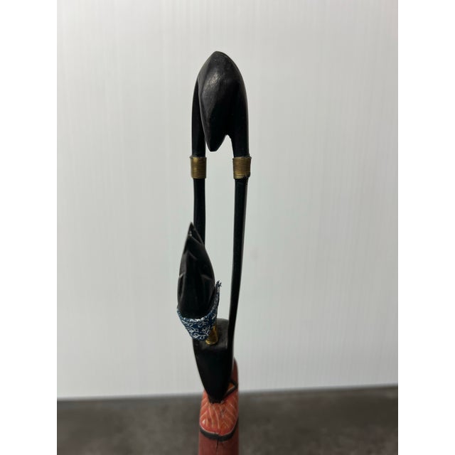 Design Plus Gallery presents a Vintage African Beaded Woman Figurine. This hand-painted fabric and wood carved figurine...