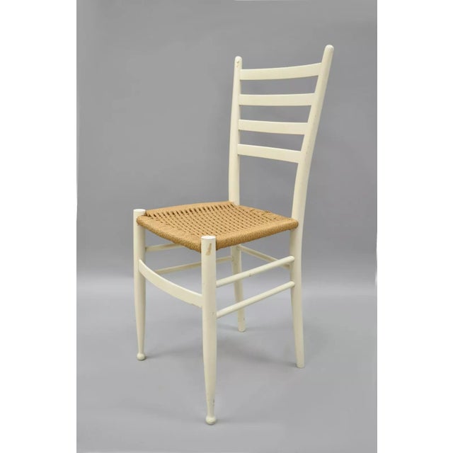 Vintage Italian Gio Ponti Style Side Chair. Item features solid wood construction, white finish, tapered legs, woven rope...