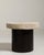 A substantial early 20th century side table with a heavier stone top and a robust wrought iron base, emphasising weight...
