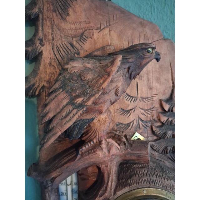 This black forest Thermometer & Barometer ,wall decoration with Eagle handcarved sculpture is made on Germany. Black...