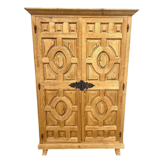 Mid-20th Century German Carved Pine Armoire For Sale