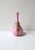 A beautiful pink and white art glass vase, hand-blown, with a hand-painted gold and bejeweled design around, circa early...