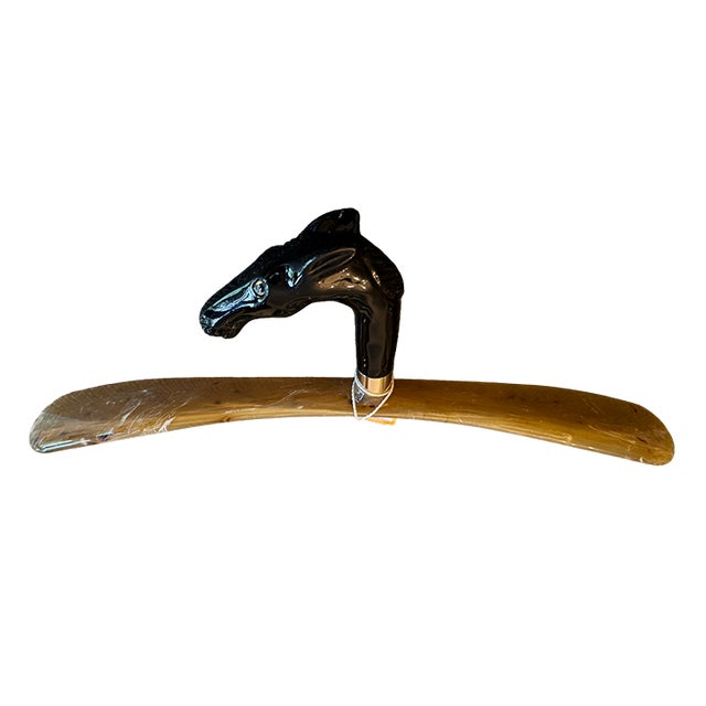 This is fun and fabulous! A striking vintage Italian luxury clothing hanger by Oerre, featuring a sculptural glossy,...