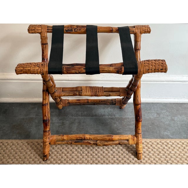Beautiful bamboo folding luggage rack with woven wicker ends and three black straps Please see condition details noted....