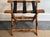 Beautiful bamboo folding luggage rack with woven wicker ends and three black straps Please see condition details noted....