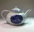 This beautiful ceramic object is a teapot "Lilyblå", also called "Arbetarservisen", of Gustavsberg. The teapot is signed...