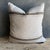 The Tinos pillow features an elevated neutral palette, highlighted by a beautiful slate blue/green. They make a warm...