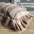 Made in France A timeless linen accent pillow with ruffle and tattered edges woven in France — The latest collection is a...