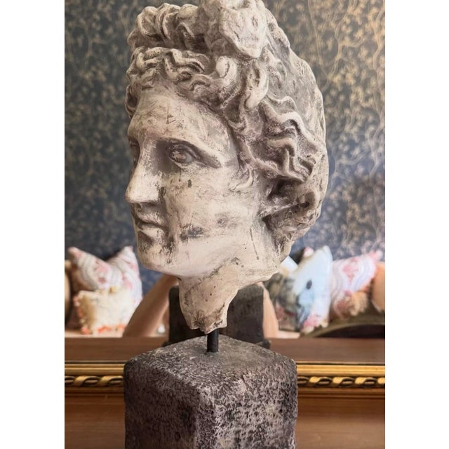 A striking Attila’s classical fragment head sculpture mounted on a substantial pedestal base. Inspired by the timeless...