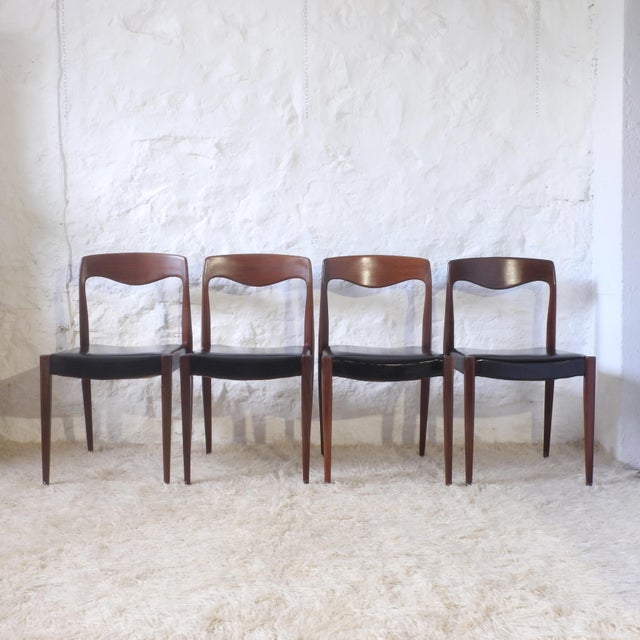 Solid teak frame, attractive curved backrest, seat upholstered in black faux leather. They are made in France, although...