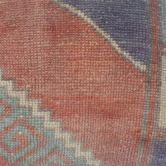 Add a touch of history and warmth to your space with this vintage handmade Turkish wool rug cushion cover. Crafted from...