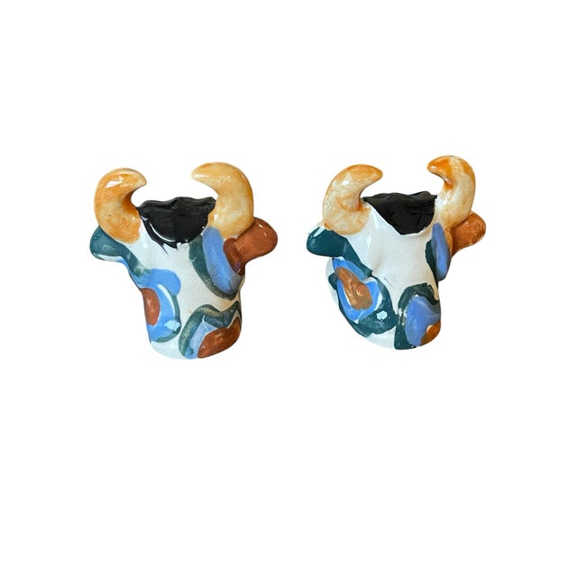 Vintage 1950s Bull salt and pepper shakers, a pair. This shaker set has the original cork stoppers, made in Japan and does...