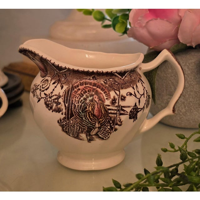 Vintage Johnson Brothers "His Majesty" creamer pitcher. Featuring a colorful center turkey and a pattern of festive fall...
